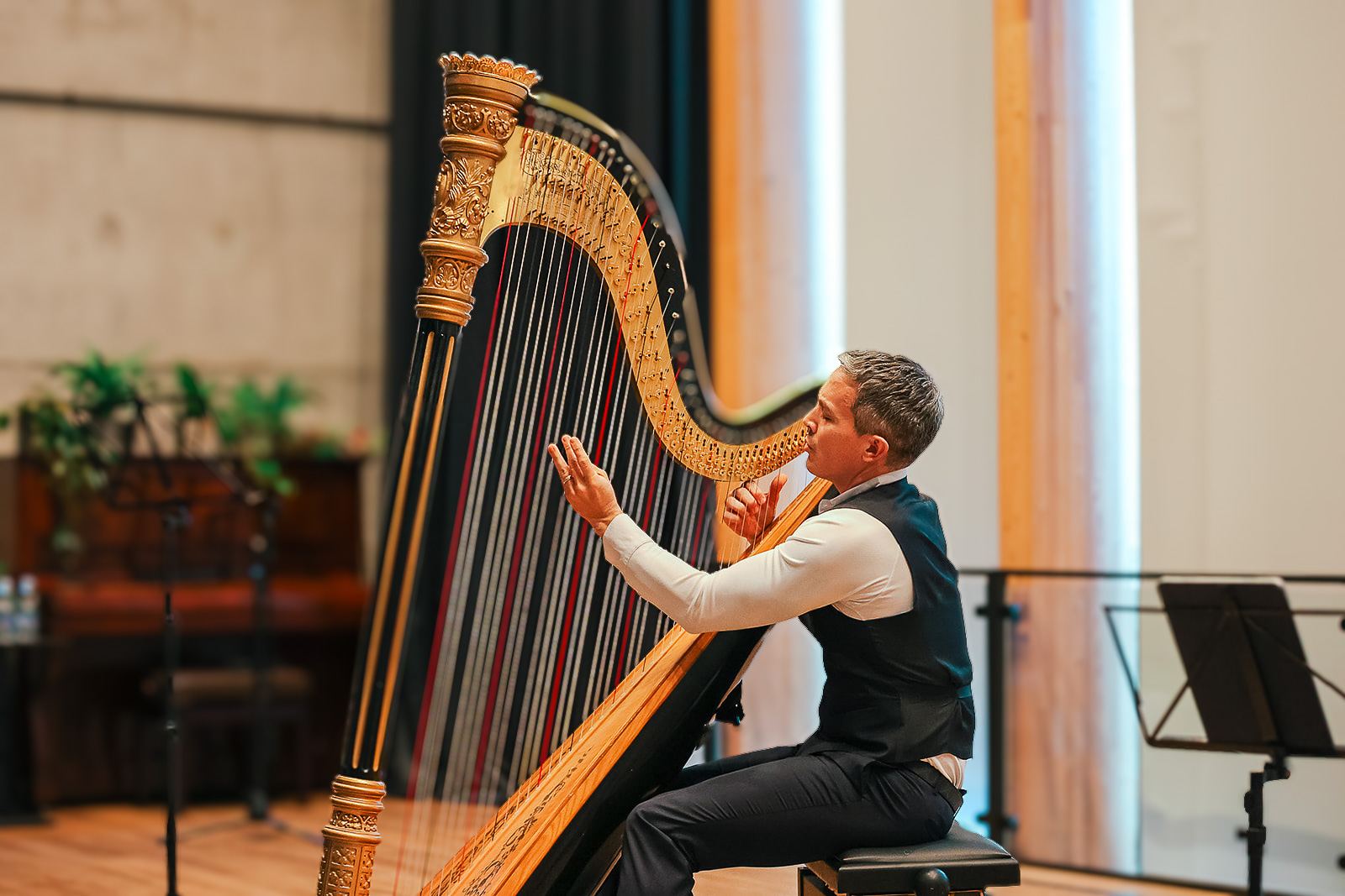 Emmanuel Ceysson playing, seen across the room