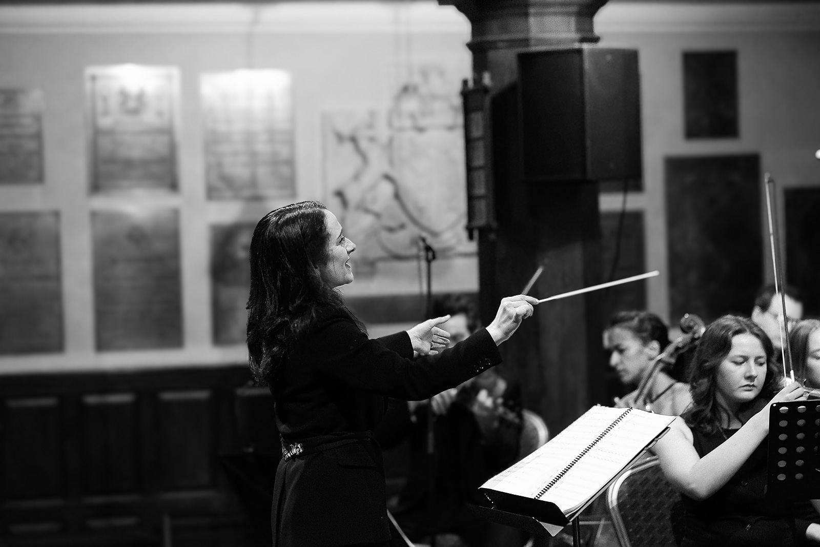 Black and white: Amy Skates conducting the young string orchestra